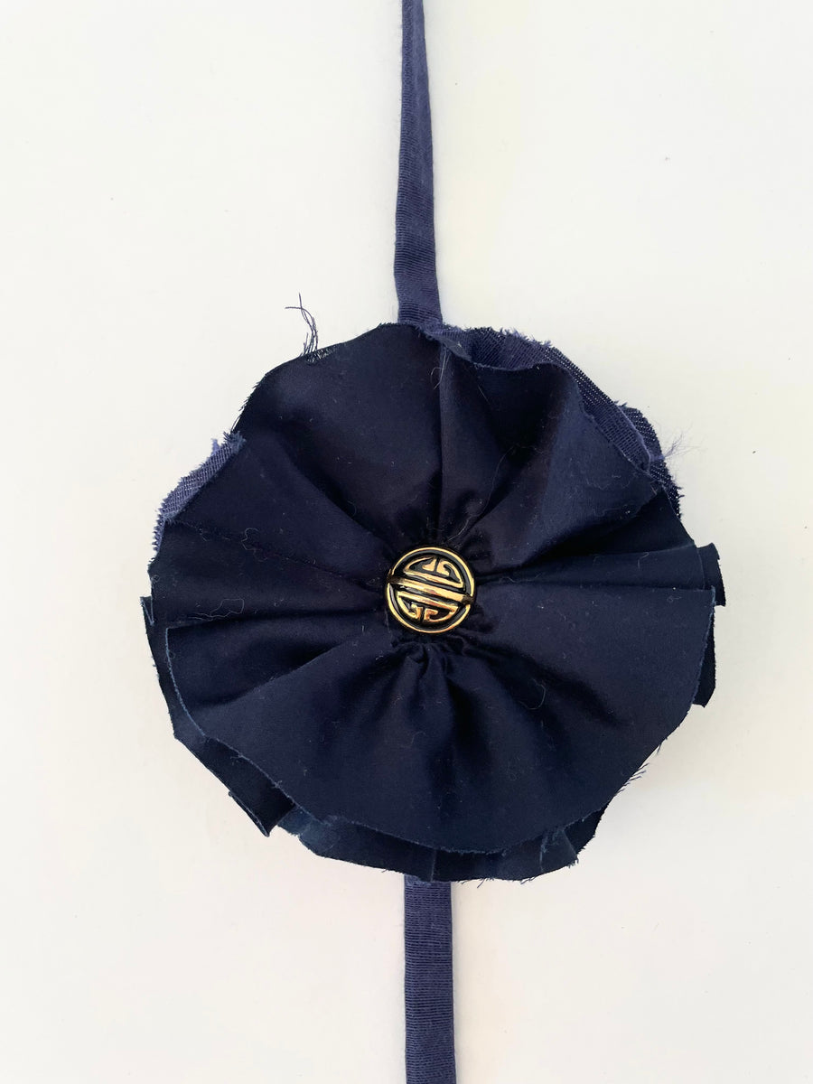 Navy flower accessory w/gold button