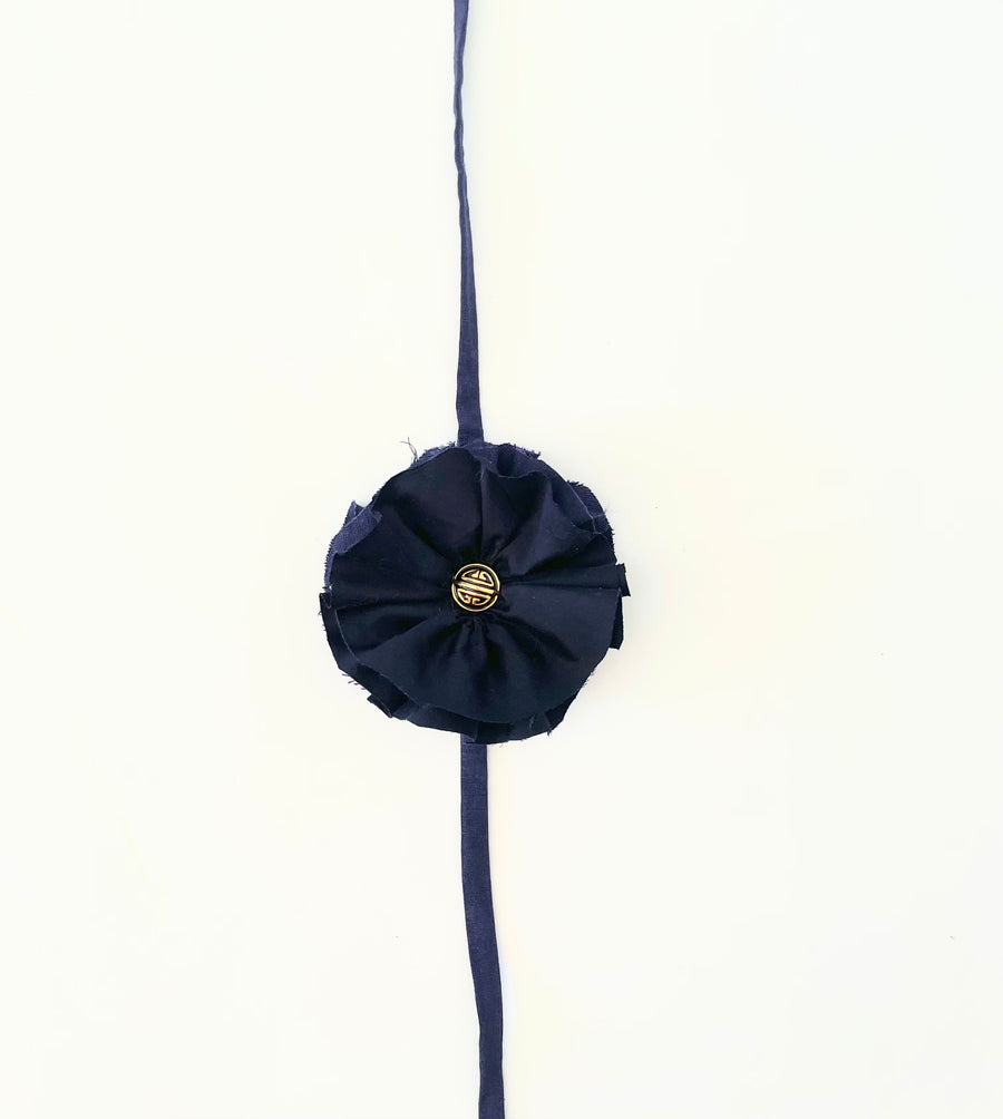 Navy flower accessory w/gold button