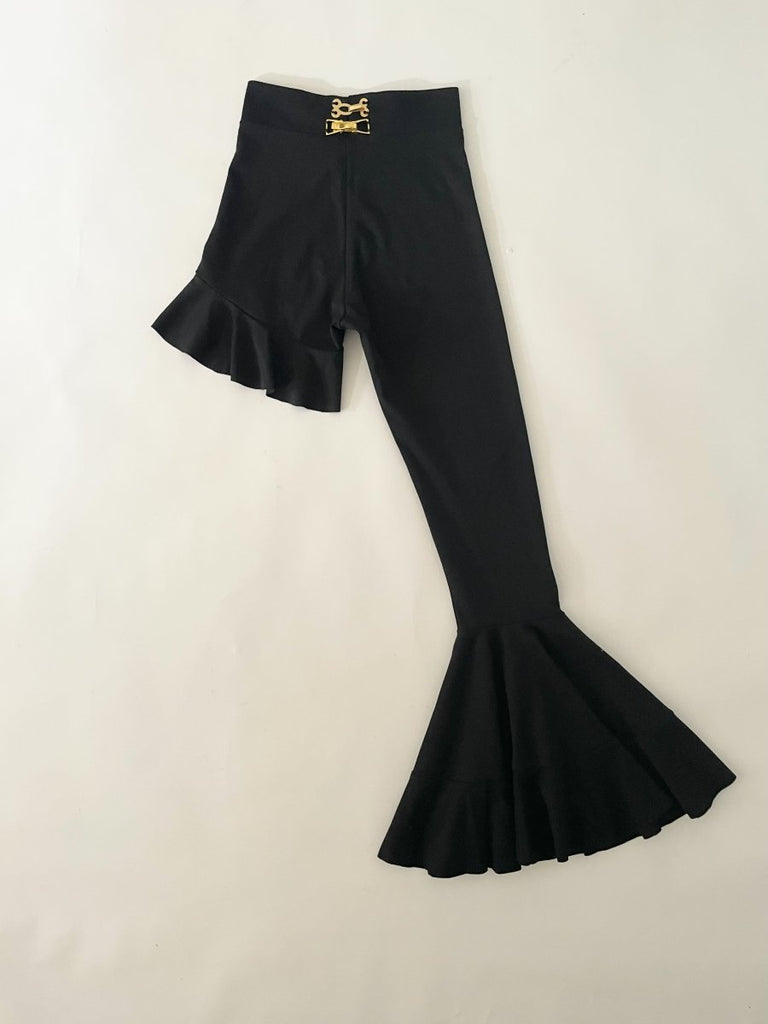 Handmade black asymmetrical ruffle leggings, size XS, with two gold metal closures at the back, crafted from synthetic double-knit by Sarah Aphrodite.