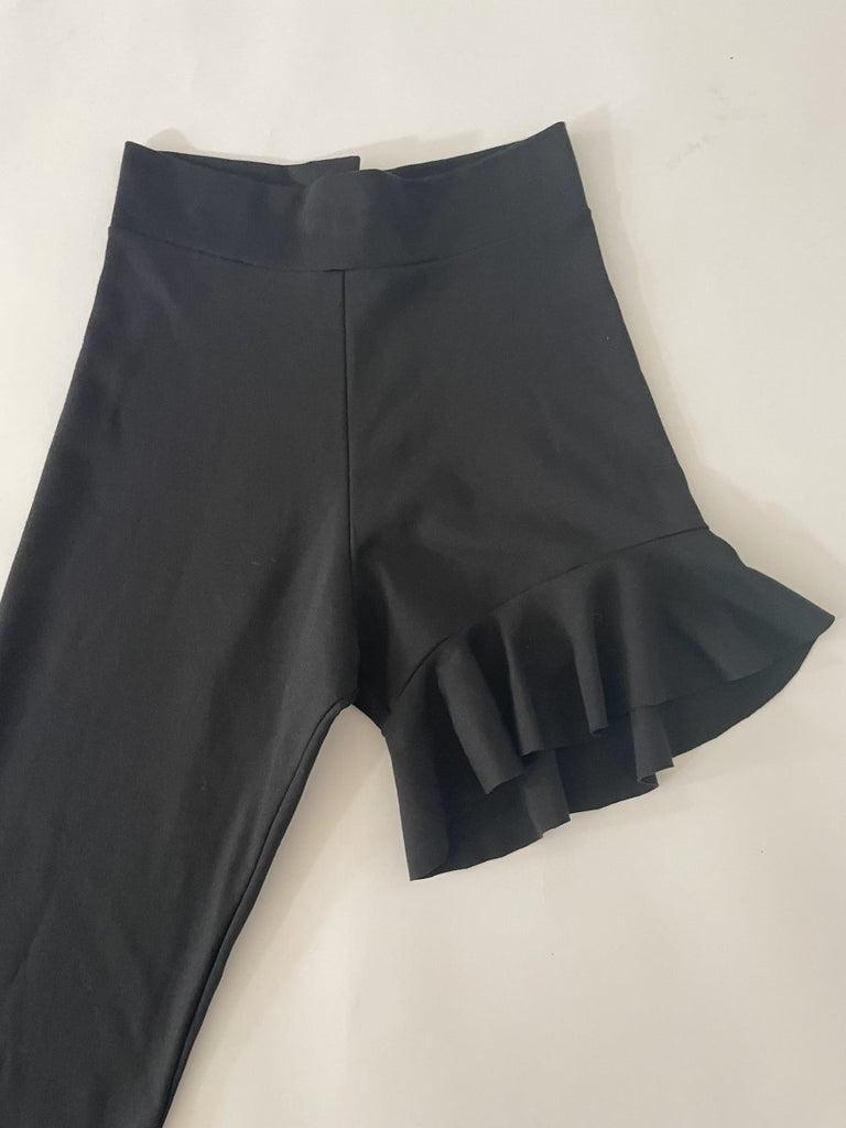 Handmade black asymmetrical ruffle leggings, size XS, with two gold metal closures at the back, crafted from synthetic double-knit by Sarah Aphrodite.