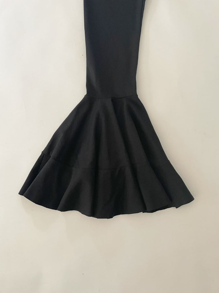 Handmade black asymmetrical ruffle leggings, size XS, with two gold metal closures at the back, crafted from synthetic double-knit by Sarah Aphrodite.