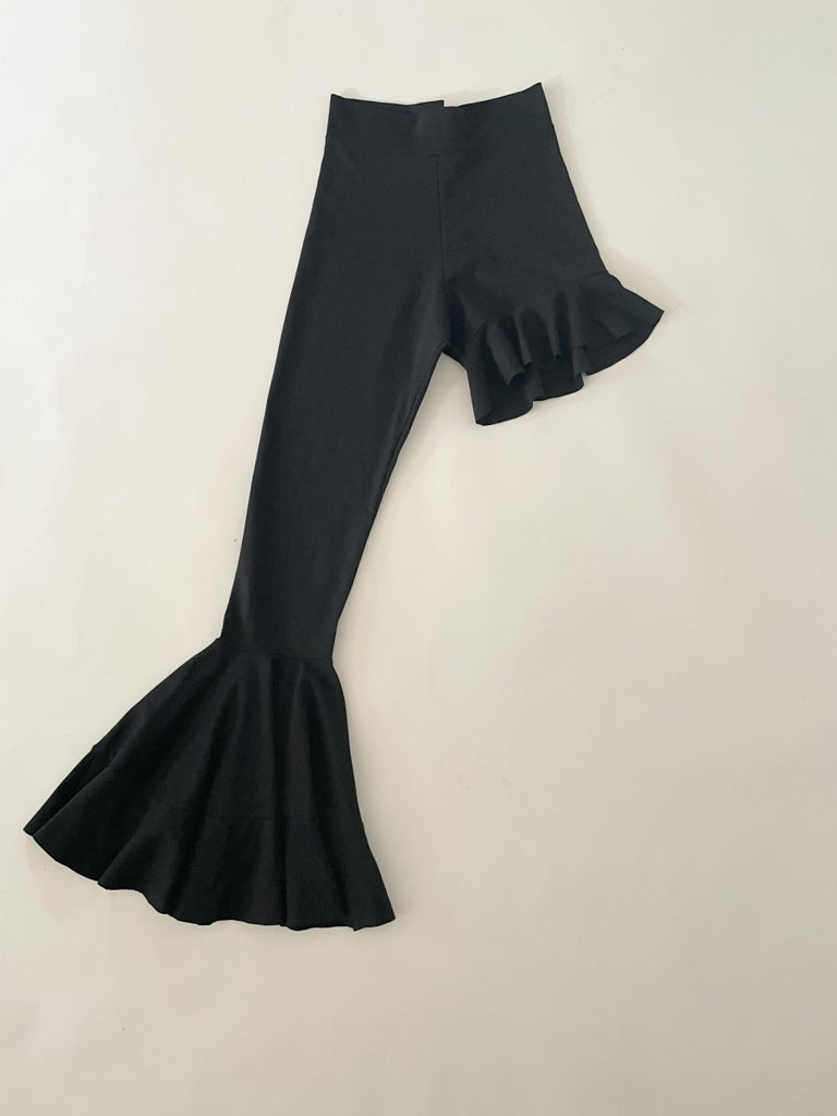 Handmade black asymmetrical ruffle leggings, size XS, with two gold metal closures at the back, crafted from synthetic double-knit by Sarah Aphrodite.