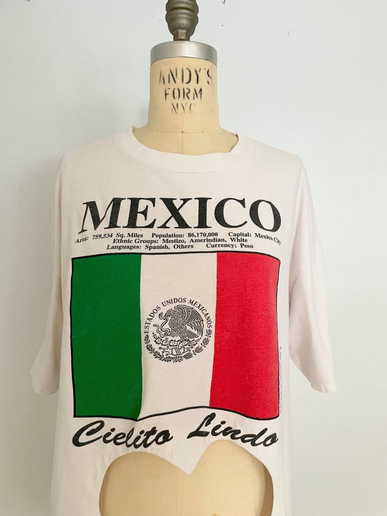 Handmade white upcycled cotton t-shirt with belly heart cut-out and Mexico flag print by Sarah Aphrodite, one-of-a-kind sustainable design