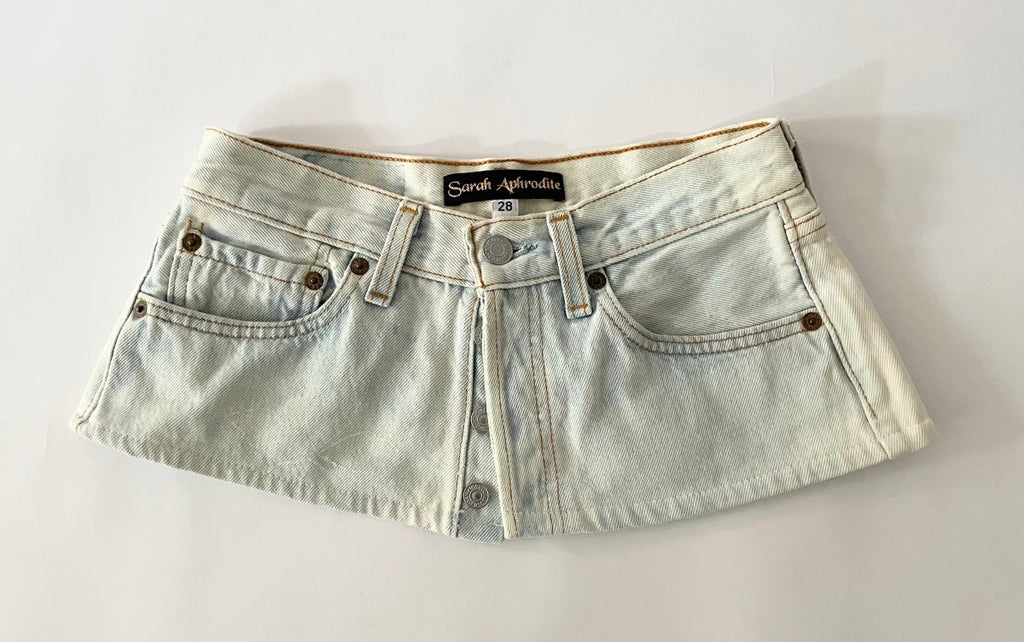 Handmade one-of-a-kind bleached denim belt by Sarah Aphrodite, size 28" waist, 7.5" wide, with hand-bleached finish, subtle painted flower mark, and original label detail on back.