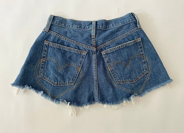 Handmade one-of-a-kind repurposed denim belt by Sarah Aphrodite, size 25" waist, fully opens with original button closure, frayed edges, high-waisted design.