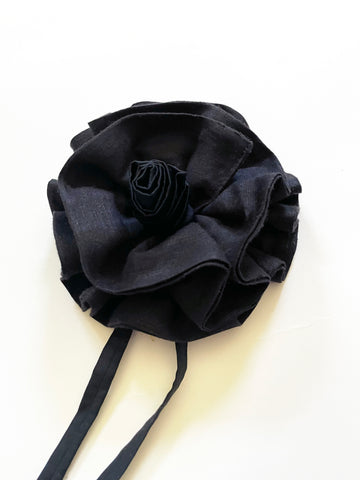 black flower accessory