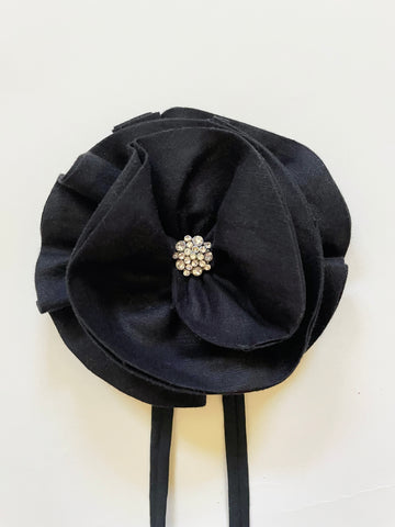 black flower accessory w/rhinestone button