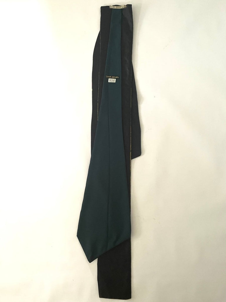 Long avant-garde handmade multicolored hair clip by Sarah Aphrodite, crafted from leftover upcycled fabrics. Sustainable fashion hair accessory.