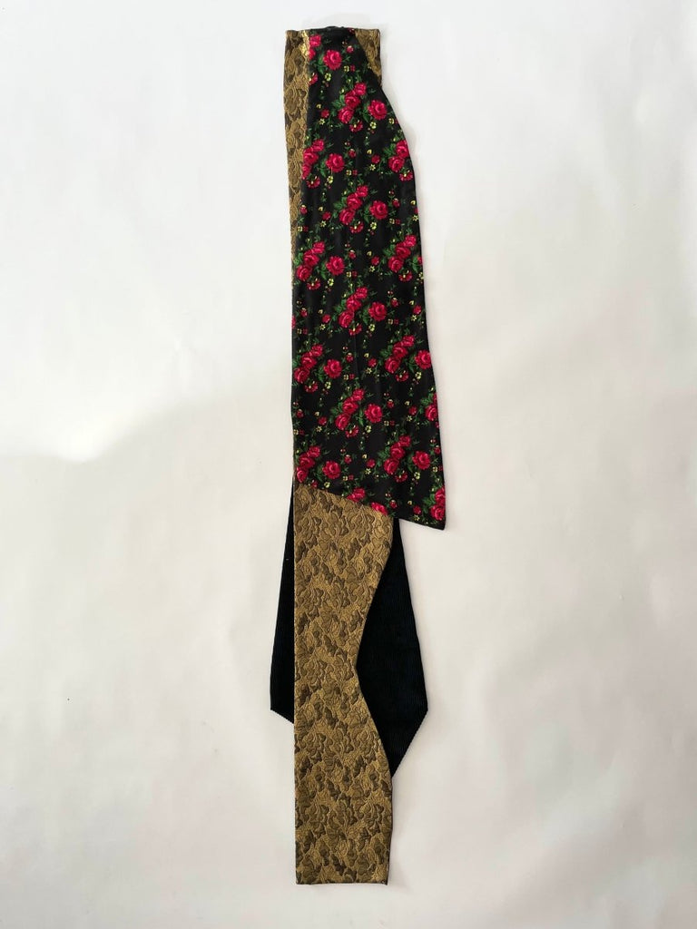 Long avant-garde handmade multicolored hair clip by Sarah Aphrodite, crafted from leftover upcycled fabrics. Sustainable fashion hair accessory.