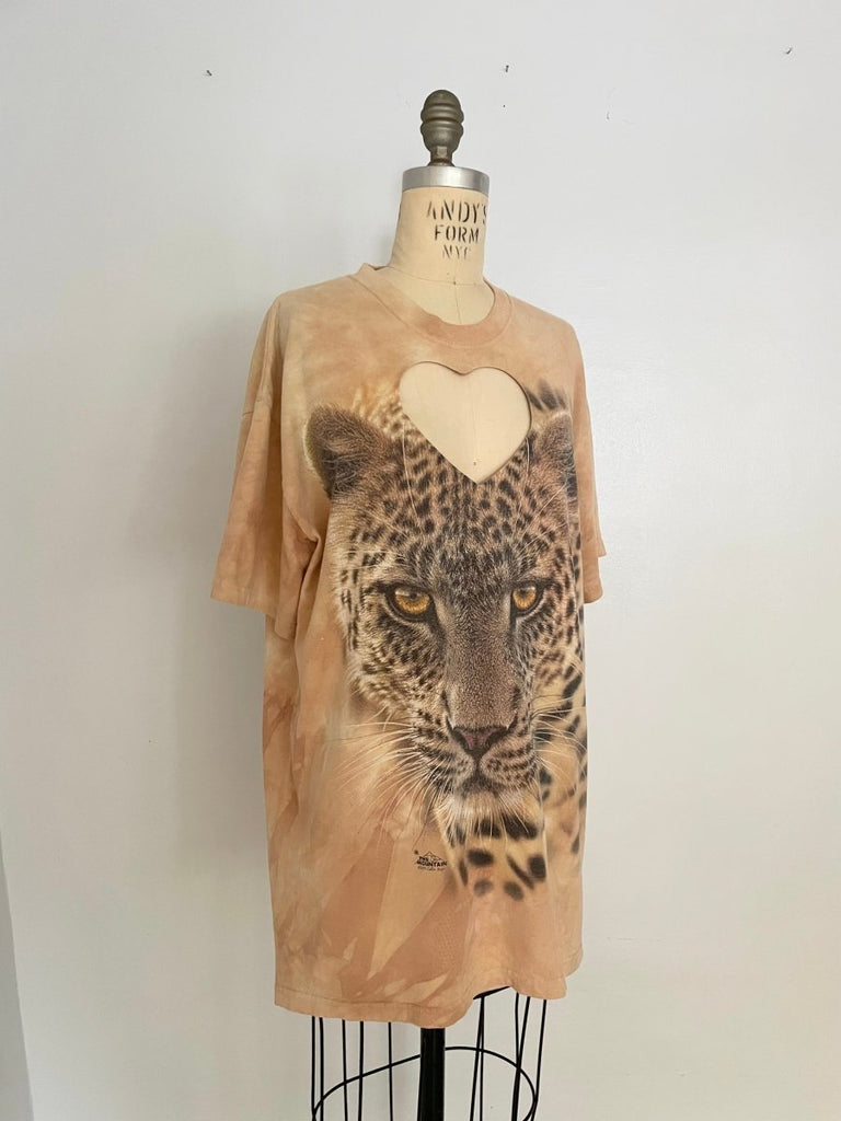 Handmade upcycled cotton leopard T-shirt with bold heart cut-out by Sarah Aphrodite, one-of-a-kind sustainable fashion piece with raw worn-in texture