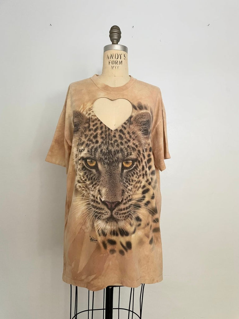 Handmade upcycled cotton leopard T-shirt with bold heart cut-out by Sarah Aphrodite, one-of-a-kind sustainable fashion piece with raw worn-in texture