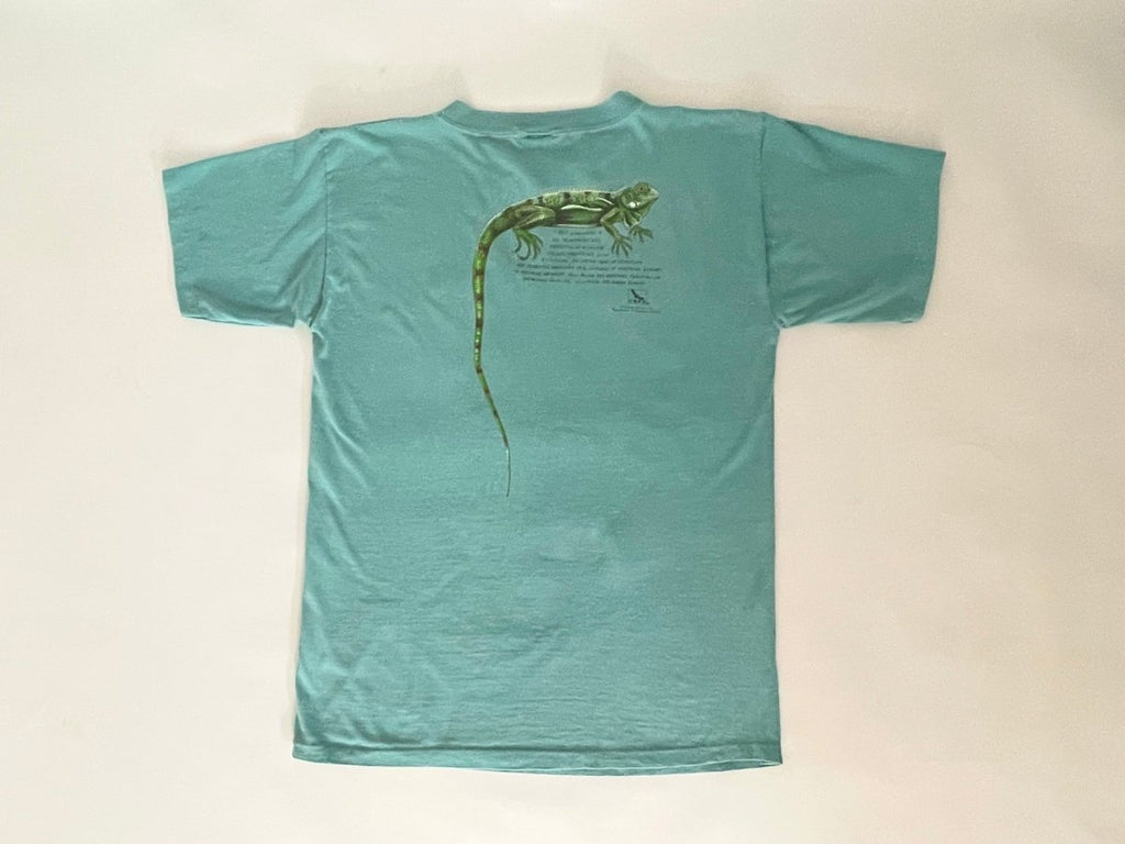 Handmade turquoise upcycled cotton T-shirt with heart cut-out and iguana print on front and back by Sarah Aphrodite, one-of-a-kind sustainable design