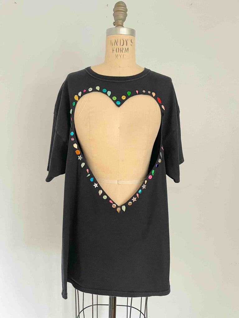 One-of-a-kind black upcycled cotton T-shirt with large heart cut-out and handsewn assorted sequins by Sarah Aphrodite, oversized XL fit