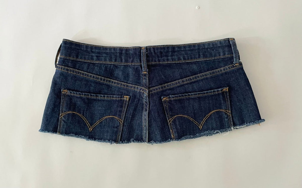 Back view of a dark blue recycled denim belt  on a white background