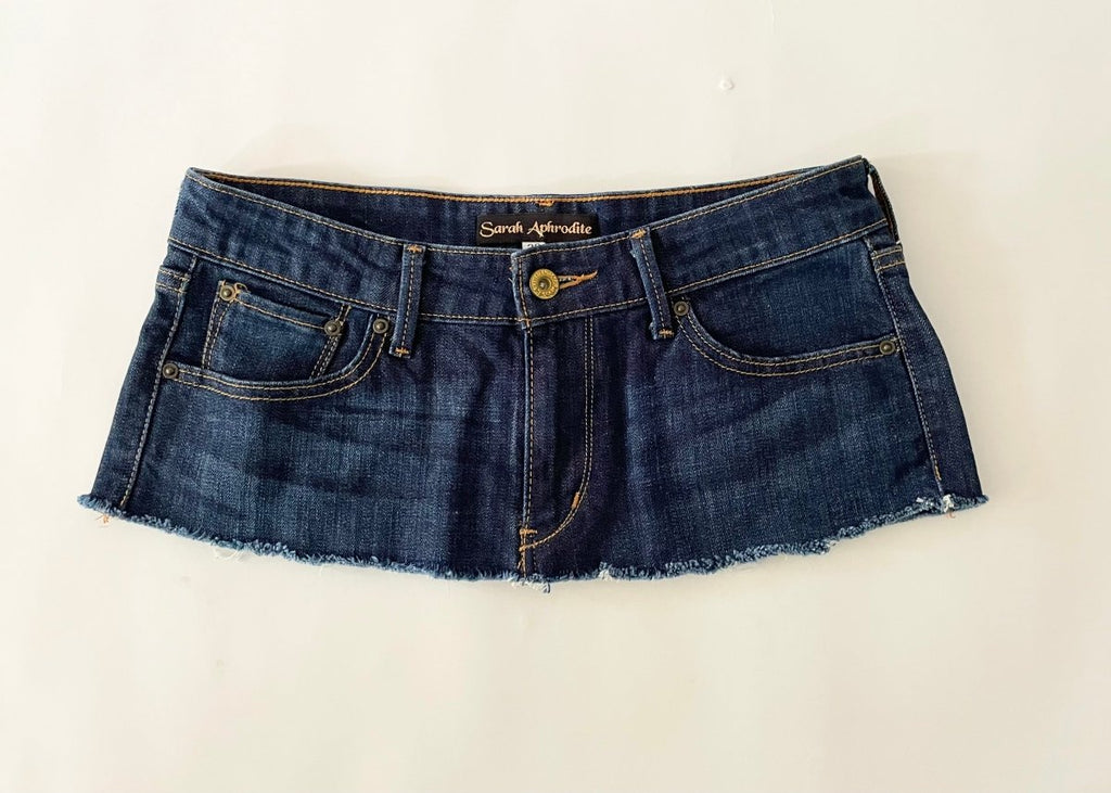 Blue denim belt with brand label on a white background