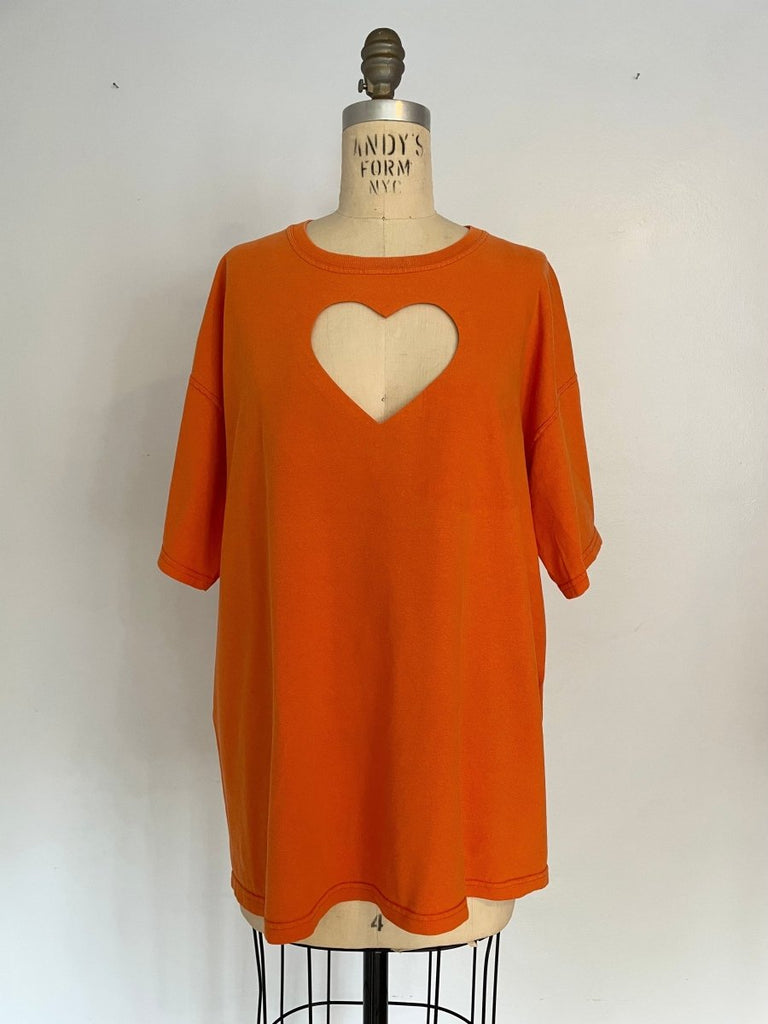 Oversized repurposed cotton t-shirt with heart cut-out on chest, displayed on XS mannequin.
