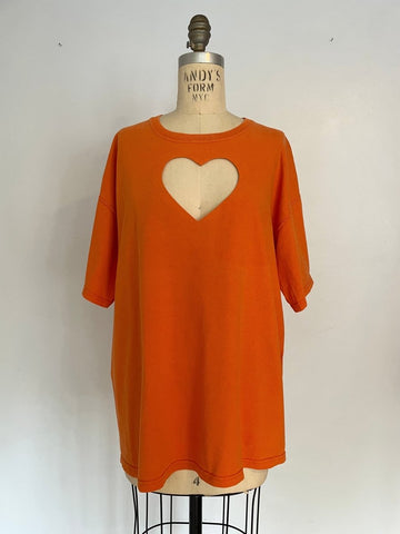Oversized repurposed cotton t-shirt with heart cut-out on chest, displayed on XS mannequin.