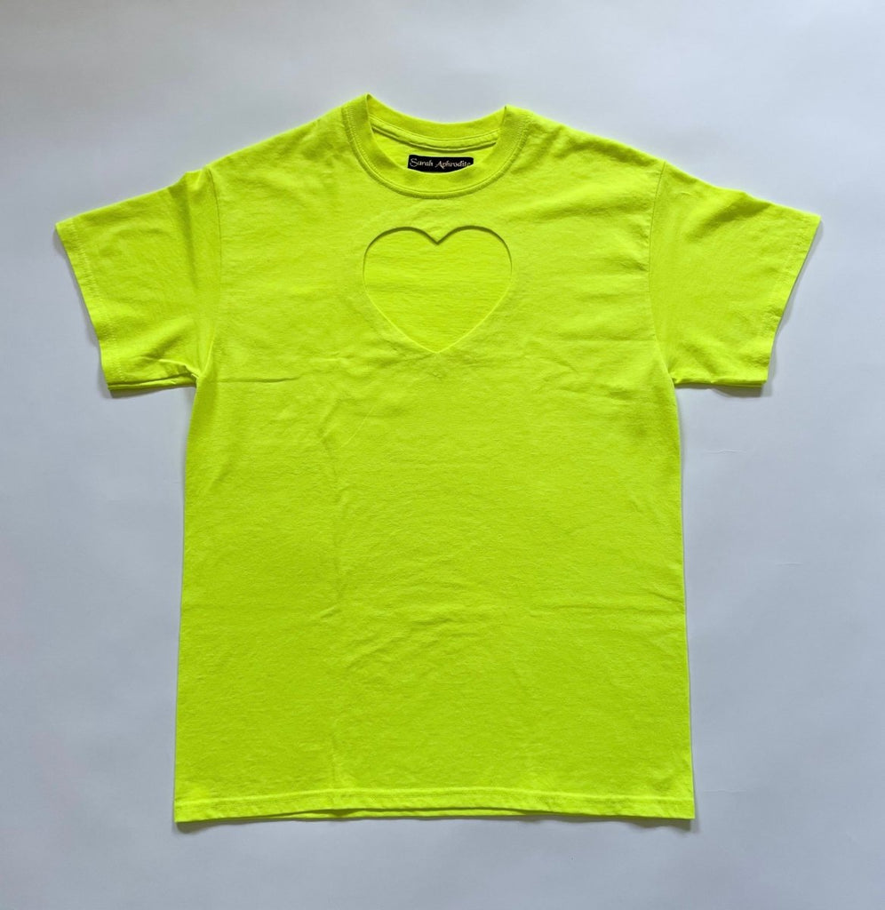 Oversized neon yellow t-shirt with a heart cut-out on the chest, displayed flat on a white background.
