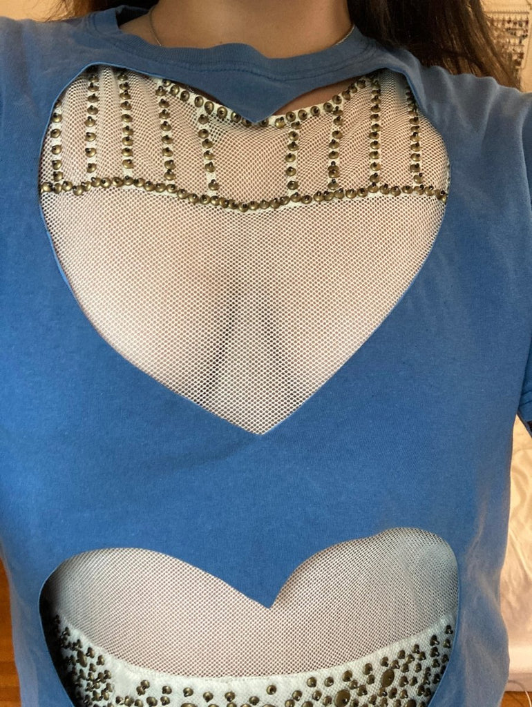 One-of-a-kind repurposed denim-blue double heart cut-out tee by Sarah Aphrodite, hand-sewn from a vintage t-shirt. Large heart openings for layering, soft washed fabric, one size fits all.