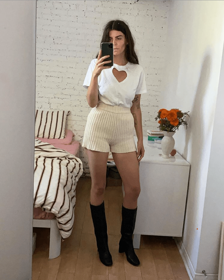 White handmade upcycled heart cut out T-shirt  size large by Sarah Aphrodite worn by Katie Merchant