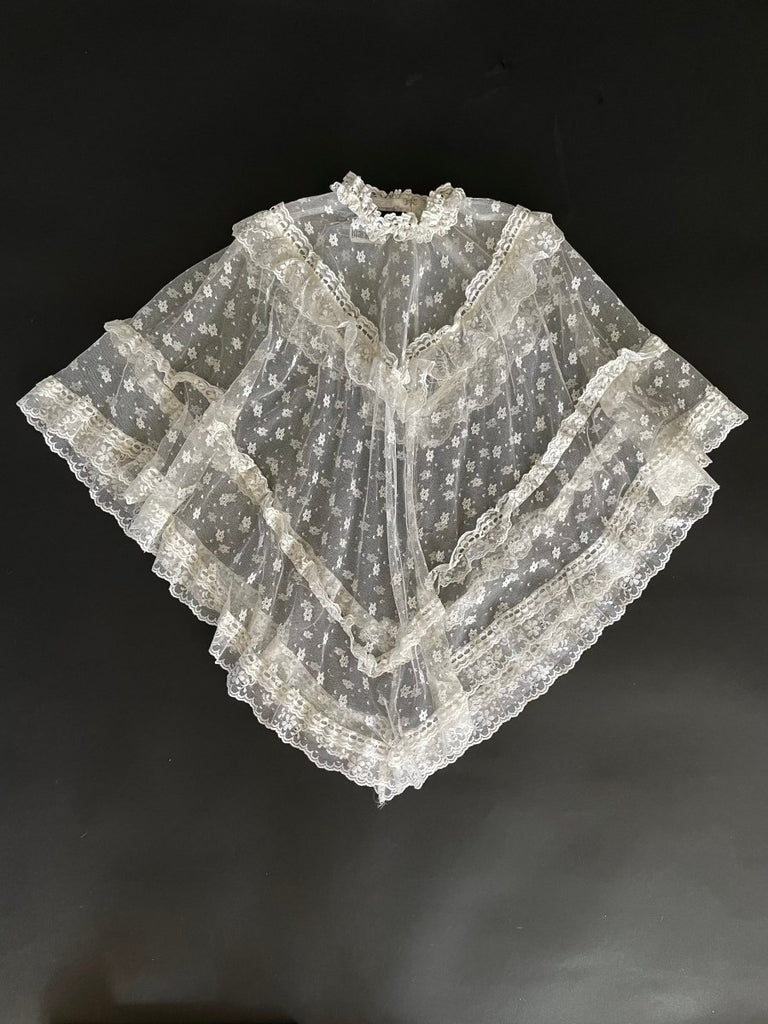 Lace leg piece on a dark background-recycled lace