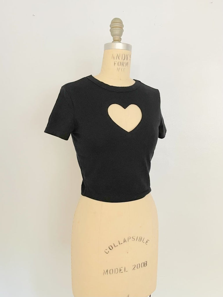 One-of-a-kind sustainable black cropped heart cut-out top by Sarah Aphrodite. Handmade from repurposed stretchy cotton-blend. Fits XS–S.