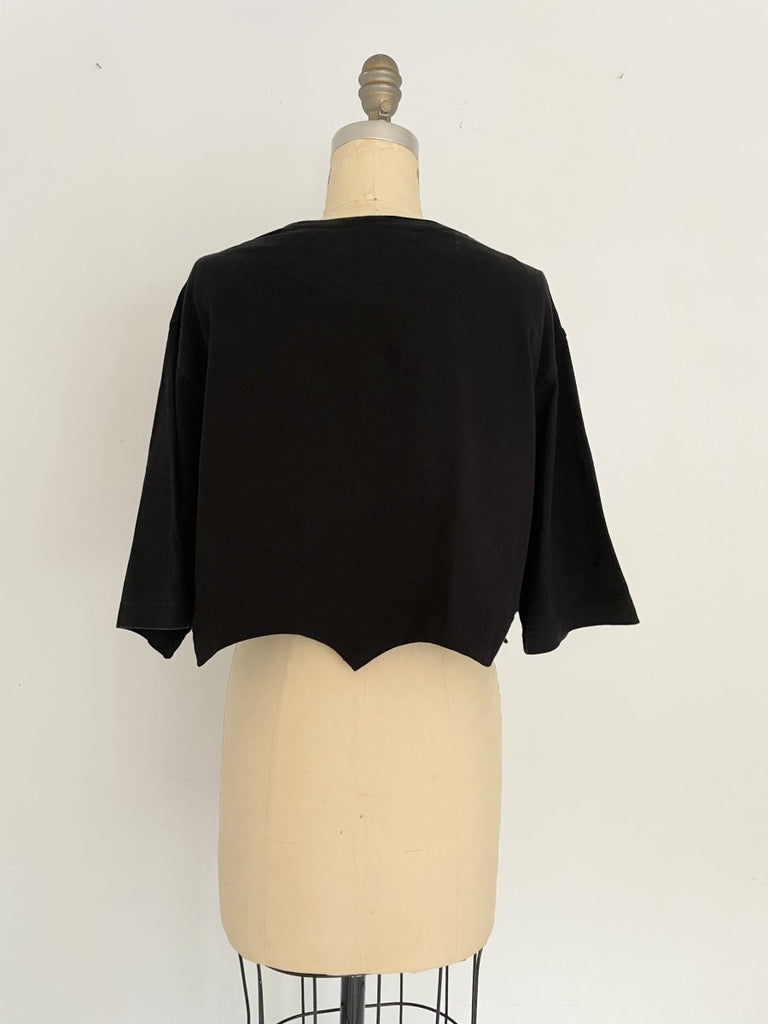 Handmade black cropped T-shirt with scallop hem, crafted from salvaged cotton. One-of-a-kind sustainable piece by Sarah Aphrodite.