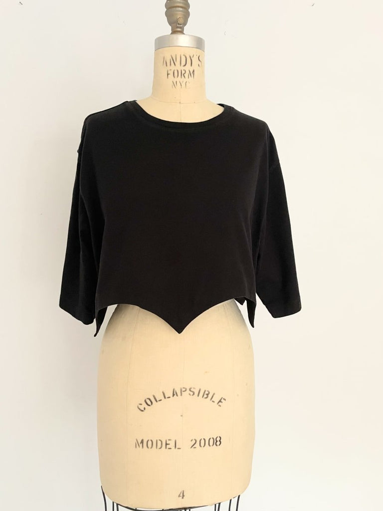Handmade black cropped T-shirt with scallop hem, crafted from salvaged cotton. One-of-a-kind sustainable piece by Sarah Aphrodite.
