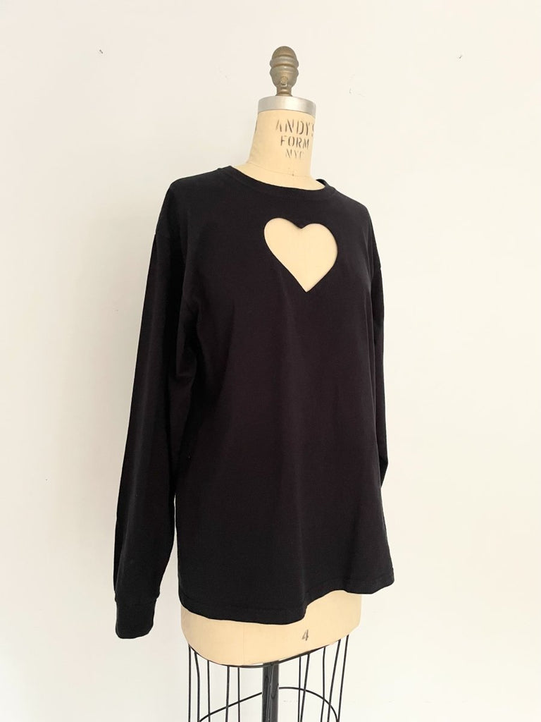 Handmade sustainable black long sleeve top with chest heart cut-out and Russell Athletic logo on sleeve. One-of-a-kind by Sarah Aphrodite. Size Medium.