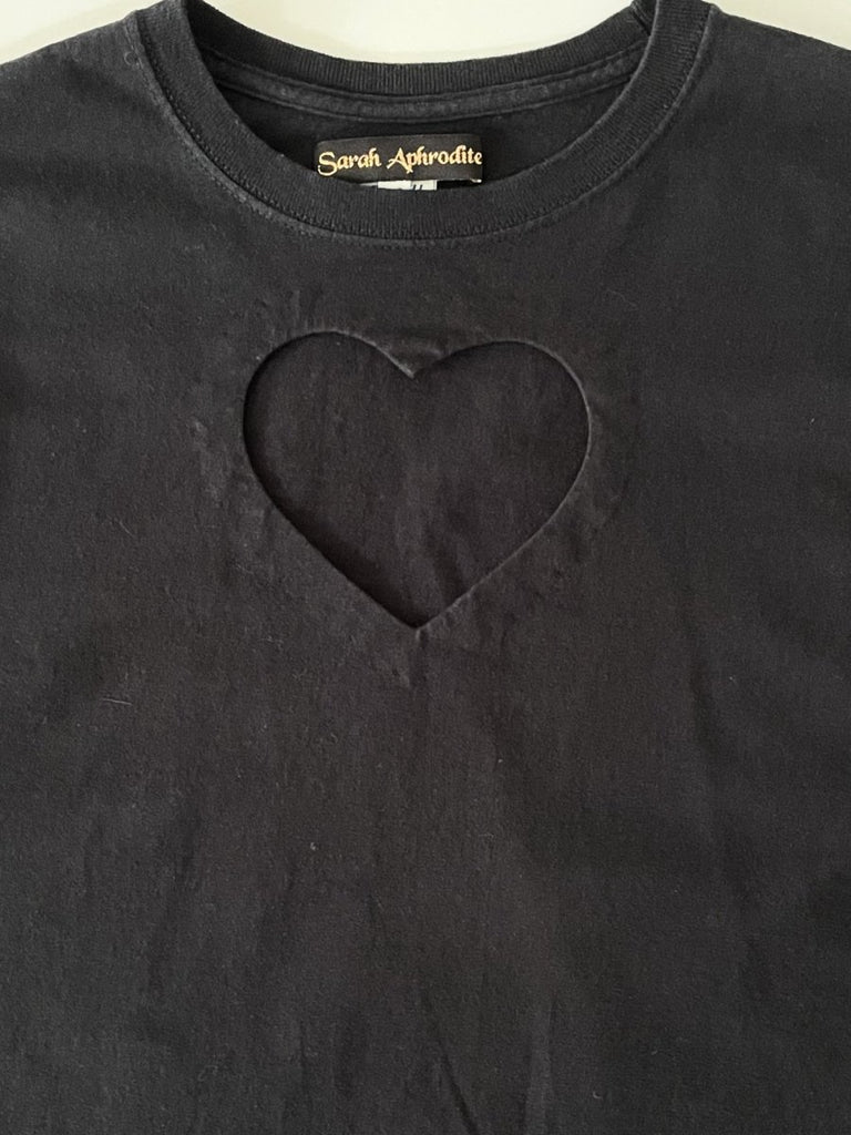 Handmade sustainable black long sleeve top with chest heart cut-out and Russell Athletic logo on sleeve. One-of-a-kind by Sarah Aphrodite. Size Medium.