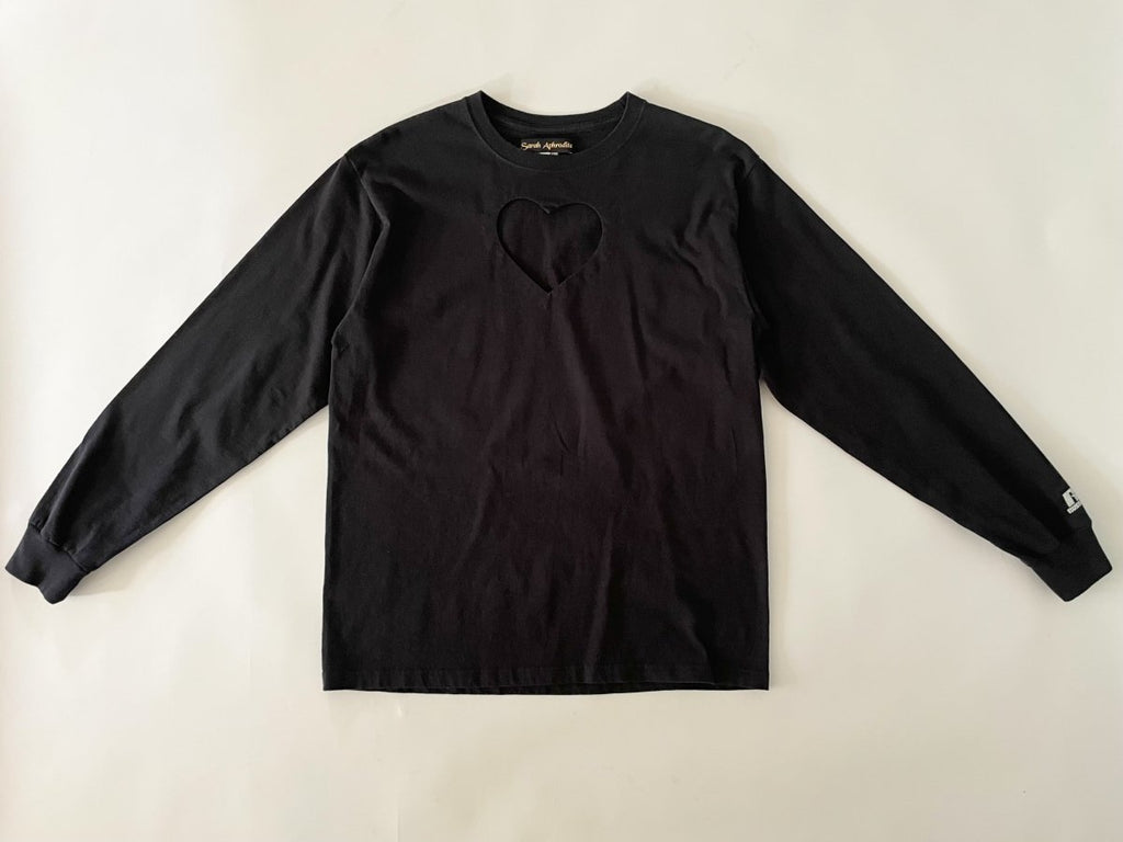 Handmade sustainable black long sleeve top with chest heart cut-out and Russell Athletic logo on sleeve. One-of-a-kind by Sarah Aphrodite. Size Medium.