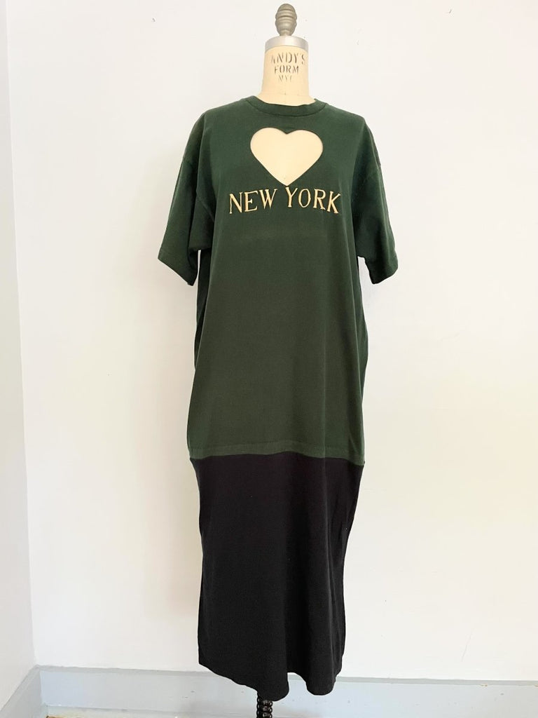 One-of-a-kind sustainable heart cut-out t-shirt dress by Sarah Aphrodite, handmade from repurposed t-shirts. Features yellow “NEW YORK” embroidery, natural fading marks, and fits Medium.
