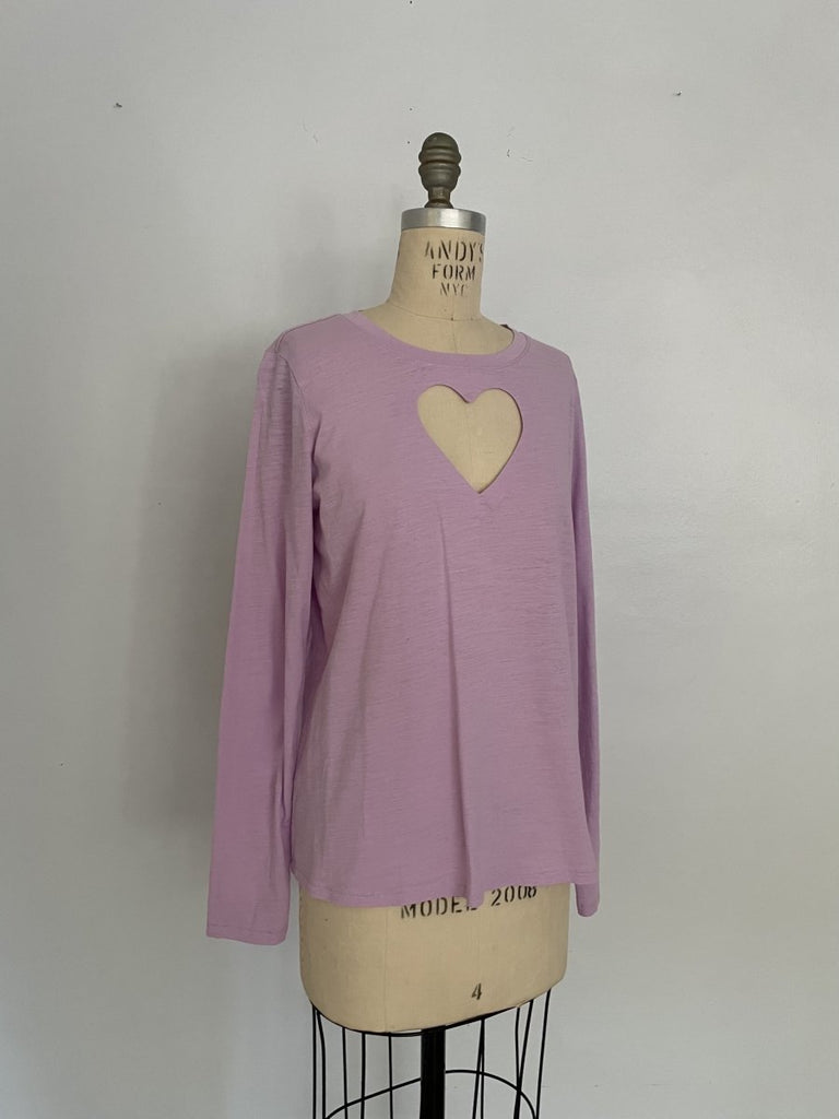 One-of-a-kind sustainable lavender long sleeve top by Sarah Aphrodite. Handmade from repurposed fabric, featuring heart cut-out detail. Fits Small–Medium.