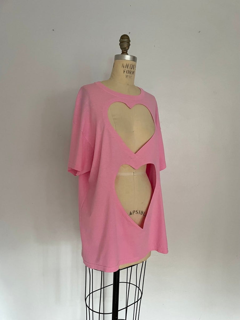 Sustainable handmade pink garment-dyed upcycled cotton T-shirt with two large heart cut-outs by Sarah Aphrodite, size large fits XS–L