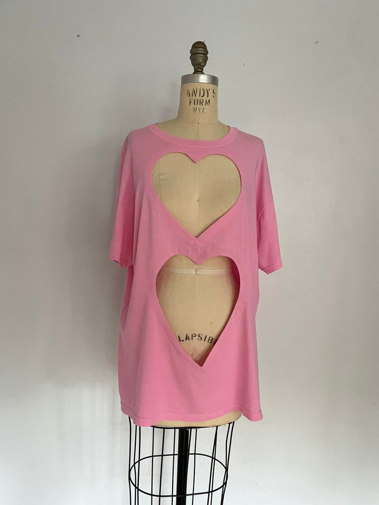 Sustainable handmade pink garment-dyed upcycled cotton T-shirt with two large heart cut-outs by Sarah Aphrodite, size large fits XS–L