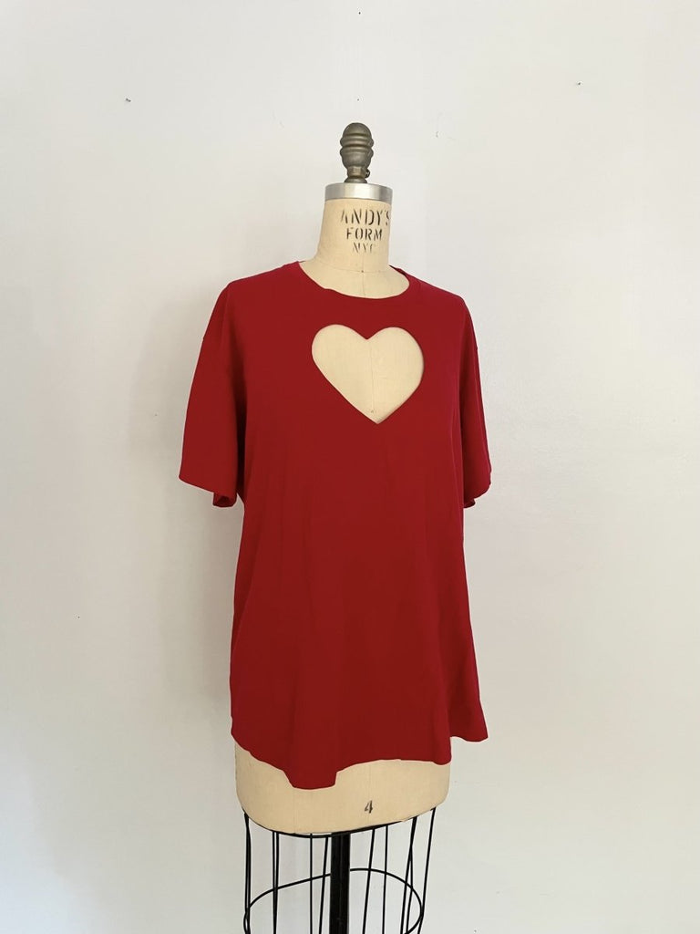 One-of-a-kind sustainable red heart cut-out t-shirt by Sarah Aphrodite. Size Large with curved front hem and straight back hem. Handmade from repurposed cotton.