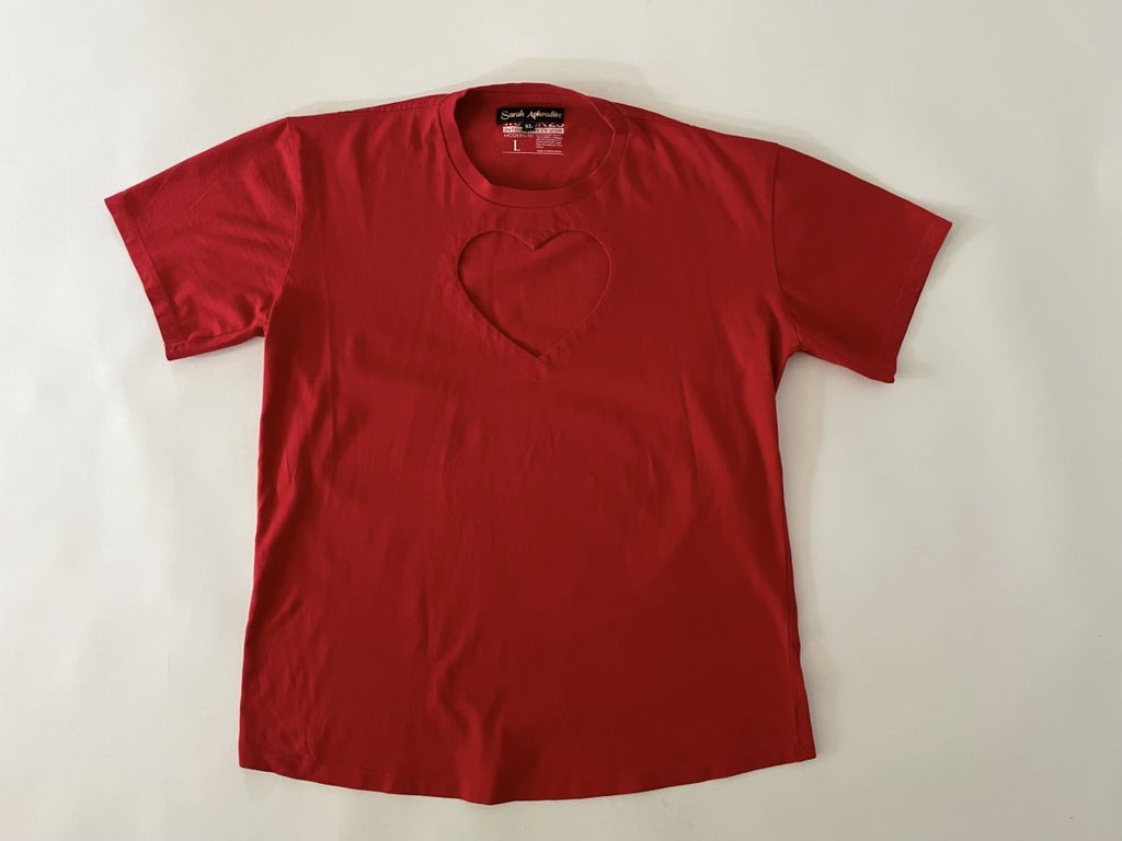 One-of-a-kind sustainable red heart cut-out t-shirt by Sarah Aphrodite. Size Large with curved front hem and straight back hem. Handmade from repurposed cotton.