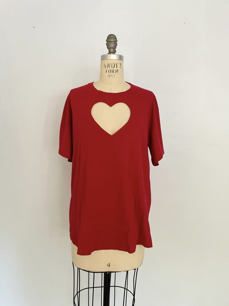 One-of-a-kind sustainable red heart cut-out t-shirt by Sarah Aphrodite. Size Large with curved front hem and straight back hem. Handmade from repurposed cotton.