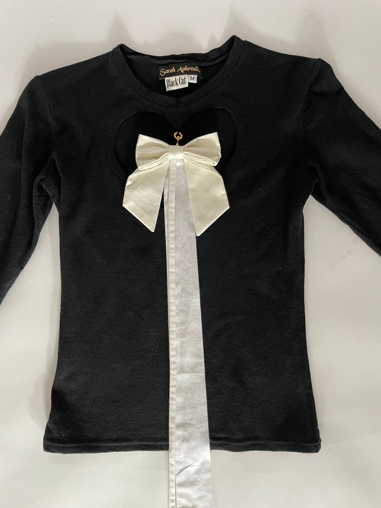 Handmade wool jersey long sleeve top with heart cut-out and detachable white bow by Sarah Aphrodite, size small, sustainable 