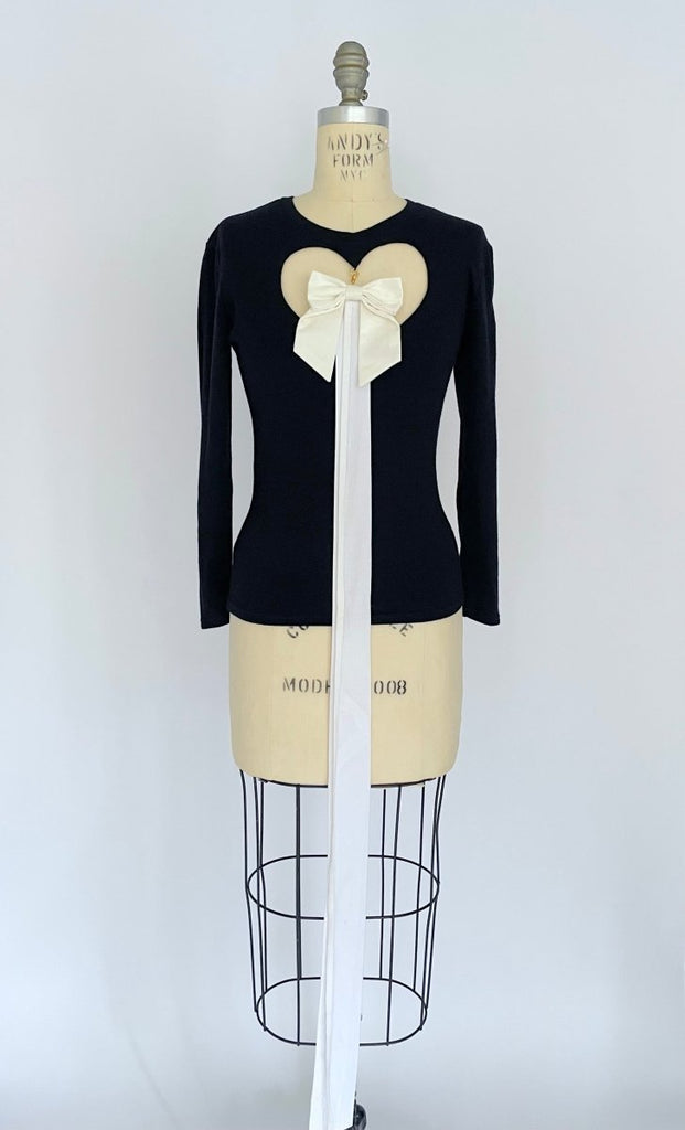 Handmade wool jersey long sleeve top with heart cut-out and detachable white bow by Sarah Aphrodite, size small, sustainable 