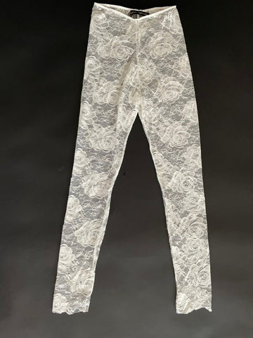 White lace pants on a black background