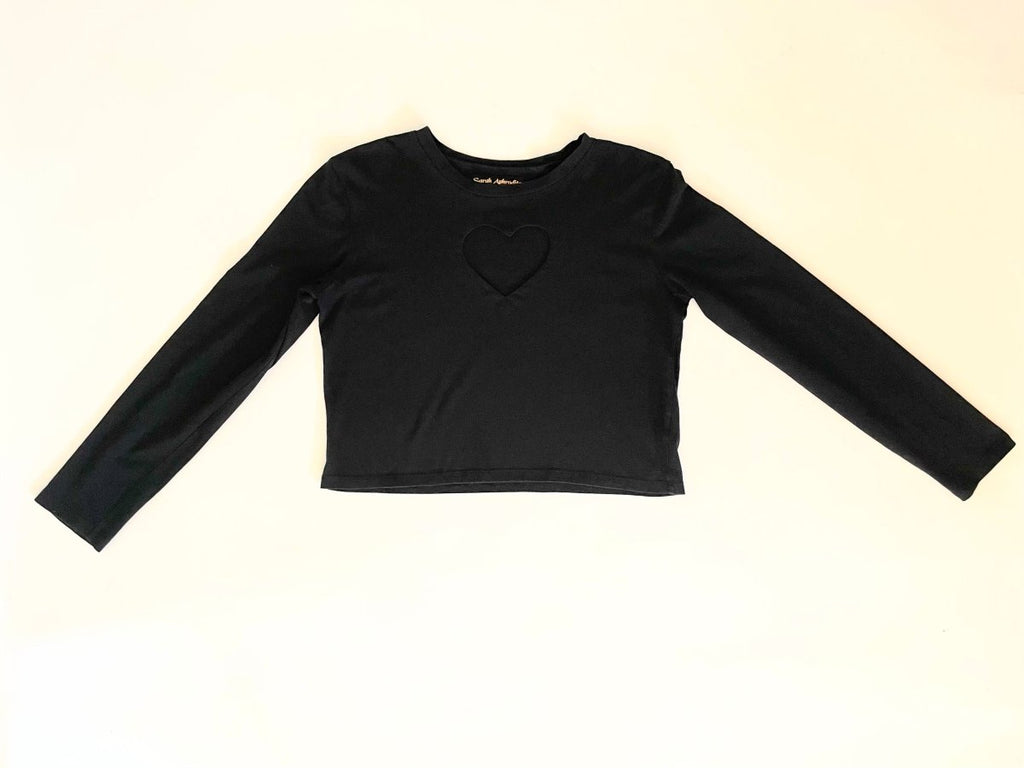 Black long sleeve cotton heart cut out displayed flat on the floor