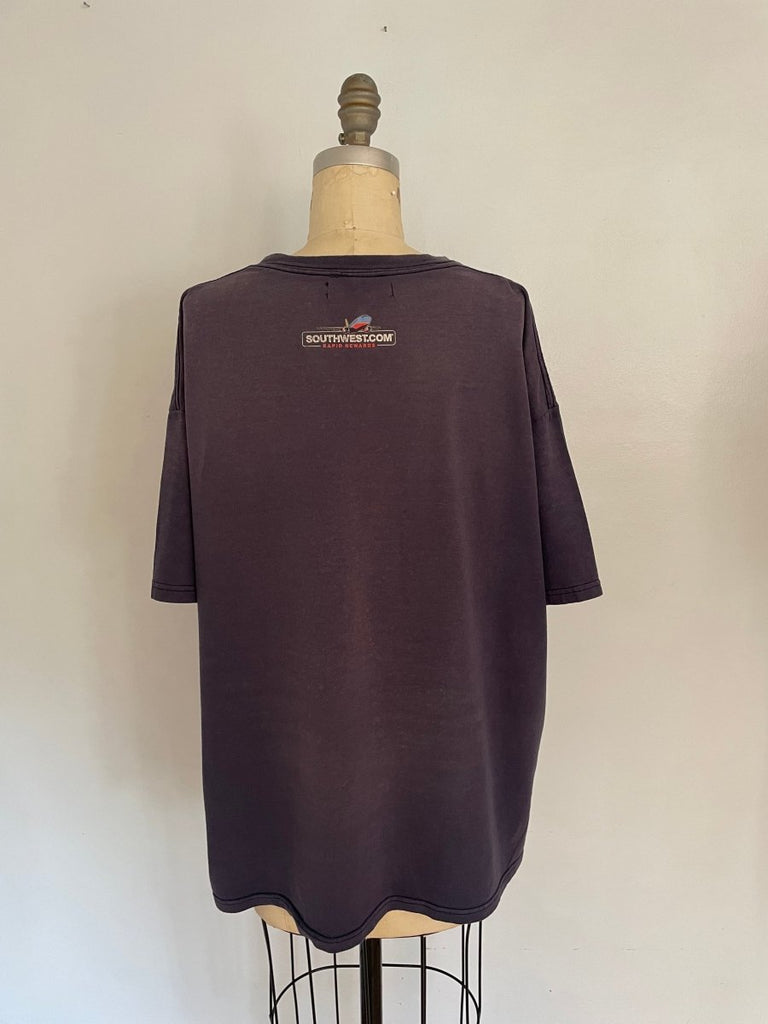 back view of handmade one-of-a-kind faded blue belly heart cut-out tee with Los Angeles print