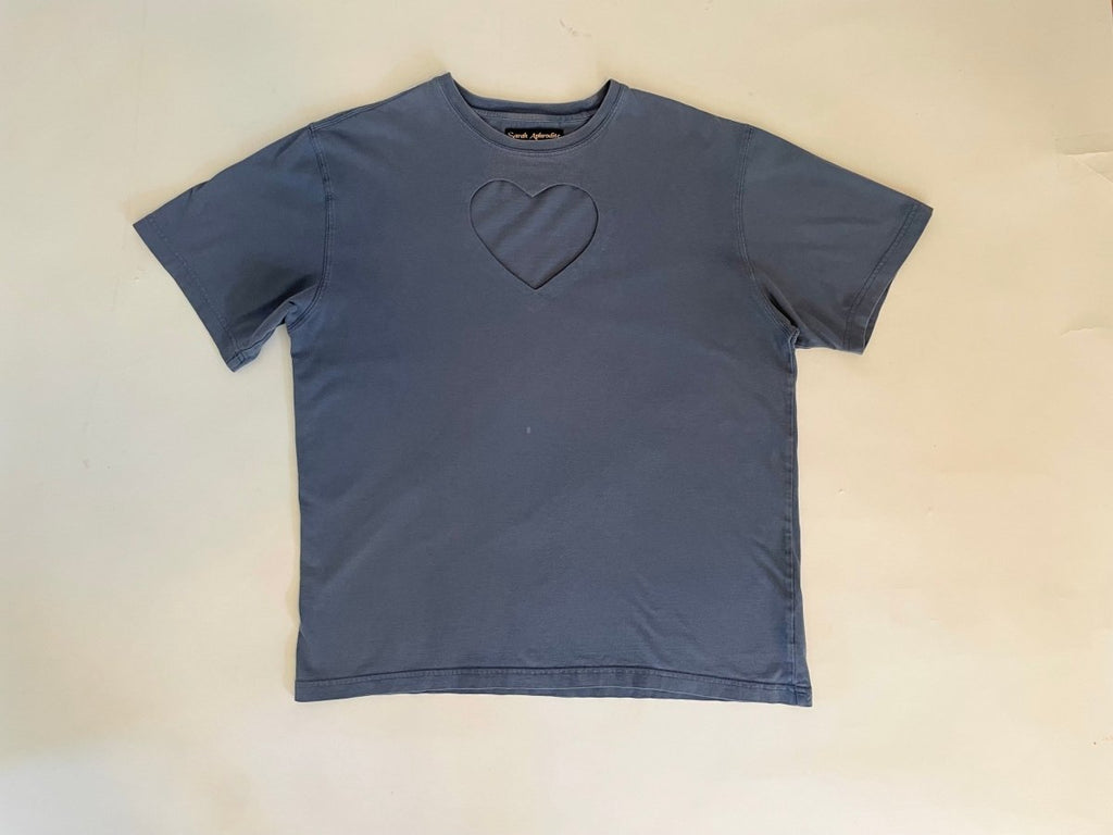 Side view of grey-blue cotton/poly blend t-shirt with heart cut-out