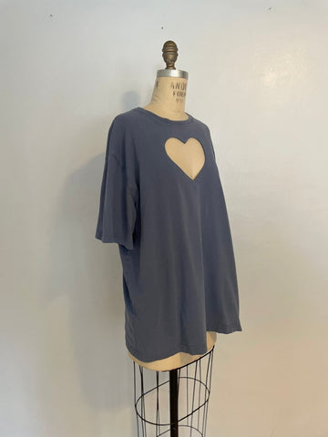 Side view of grey-blue cotton/poly blend t-shirt with heart cut-out on a mannequin
