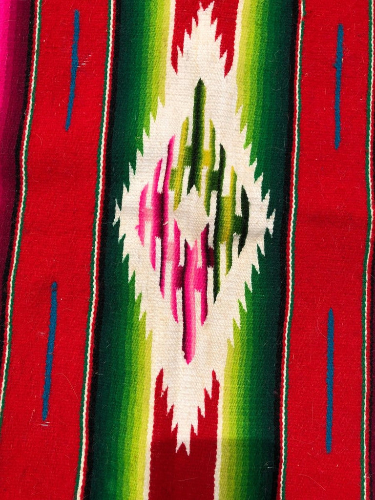 Colorful handwoven Mexican tapestry with bold traditional patterns and fringe, 46 x 117 cm
