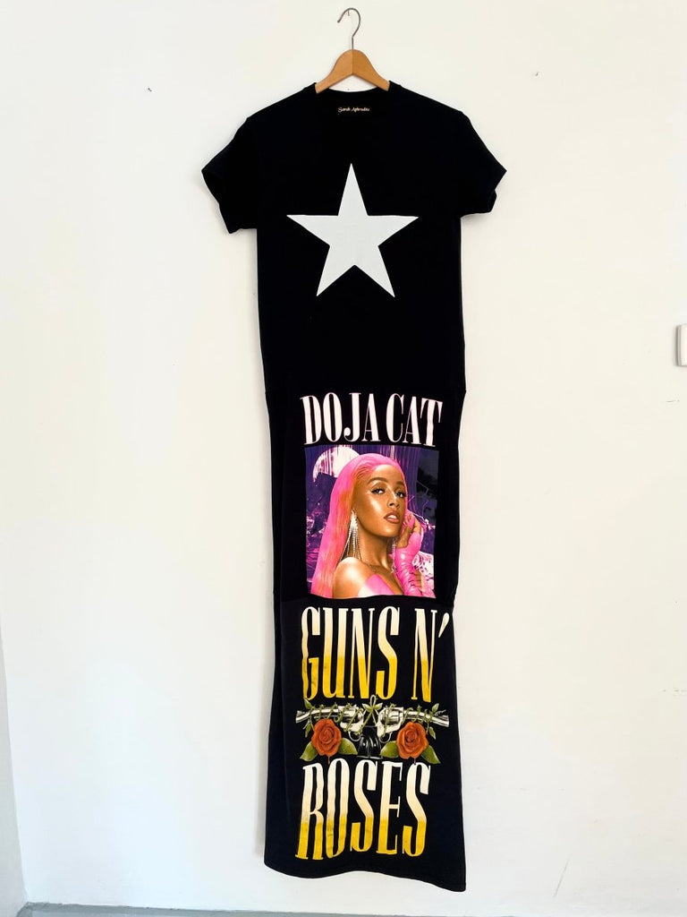 One-of-a-kind handmade T-shirt maxi dress made from recycled cotton tees on a hanger against a white wall