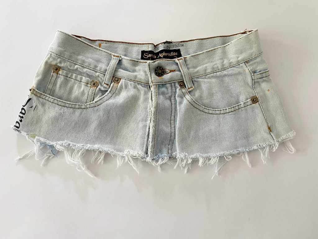 Recycled bleached denim belt with black silkscreen print, frayed edge, rustic hardware, and original label – size 28 waist