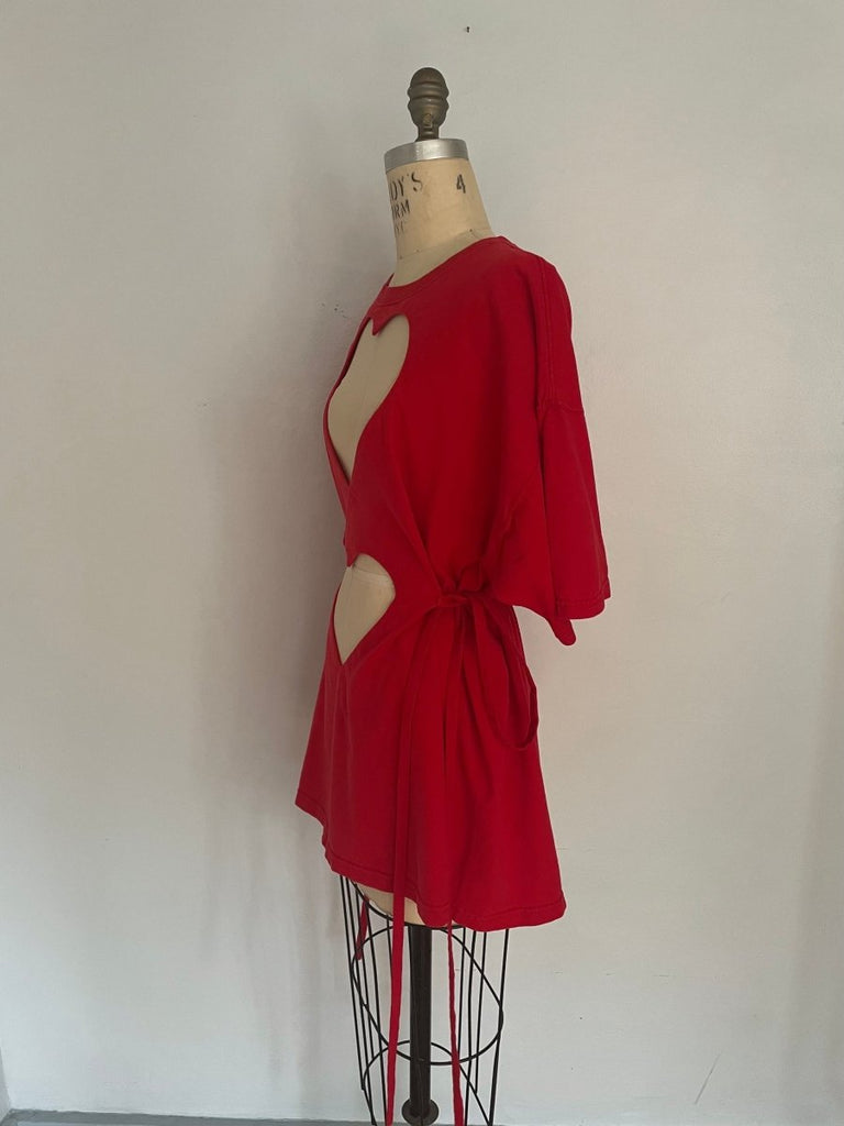 side view of one-of-a-kind red double heart cut-out t-shirt with ties