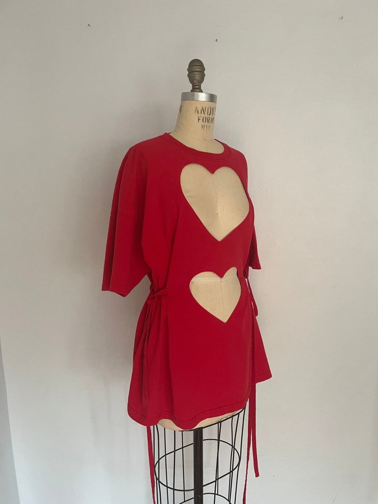 side view of one-of-a-kind red double heart cut-out t-shirt with ties